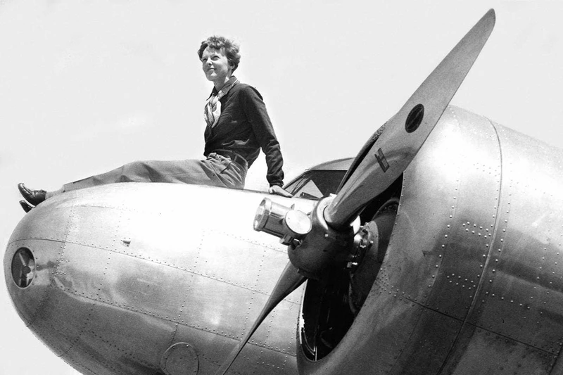 Amelia Earhart sitting on a plane