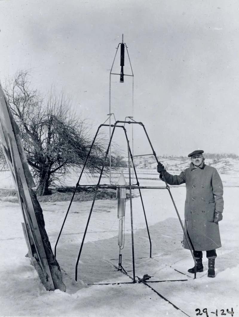 Robert Goddard with first liquid-fueled rocket